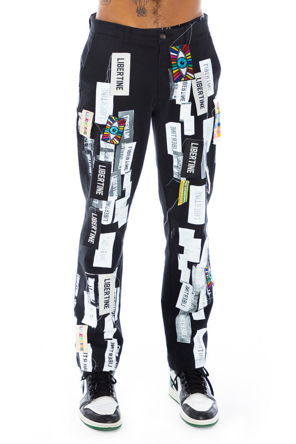 SILK SCREENED ‘LABEL MANIA' BLACK CHINOS - PANTS - Libertine